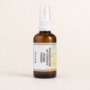 Helichrysum essential oil in amber bottle - studio photograph
